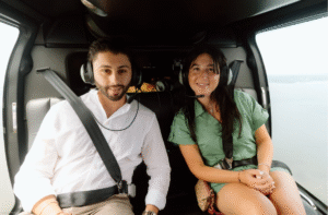 Couple - seated in helicopter